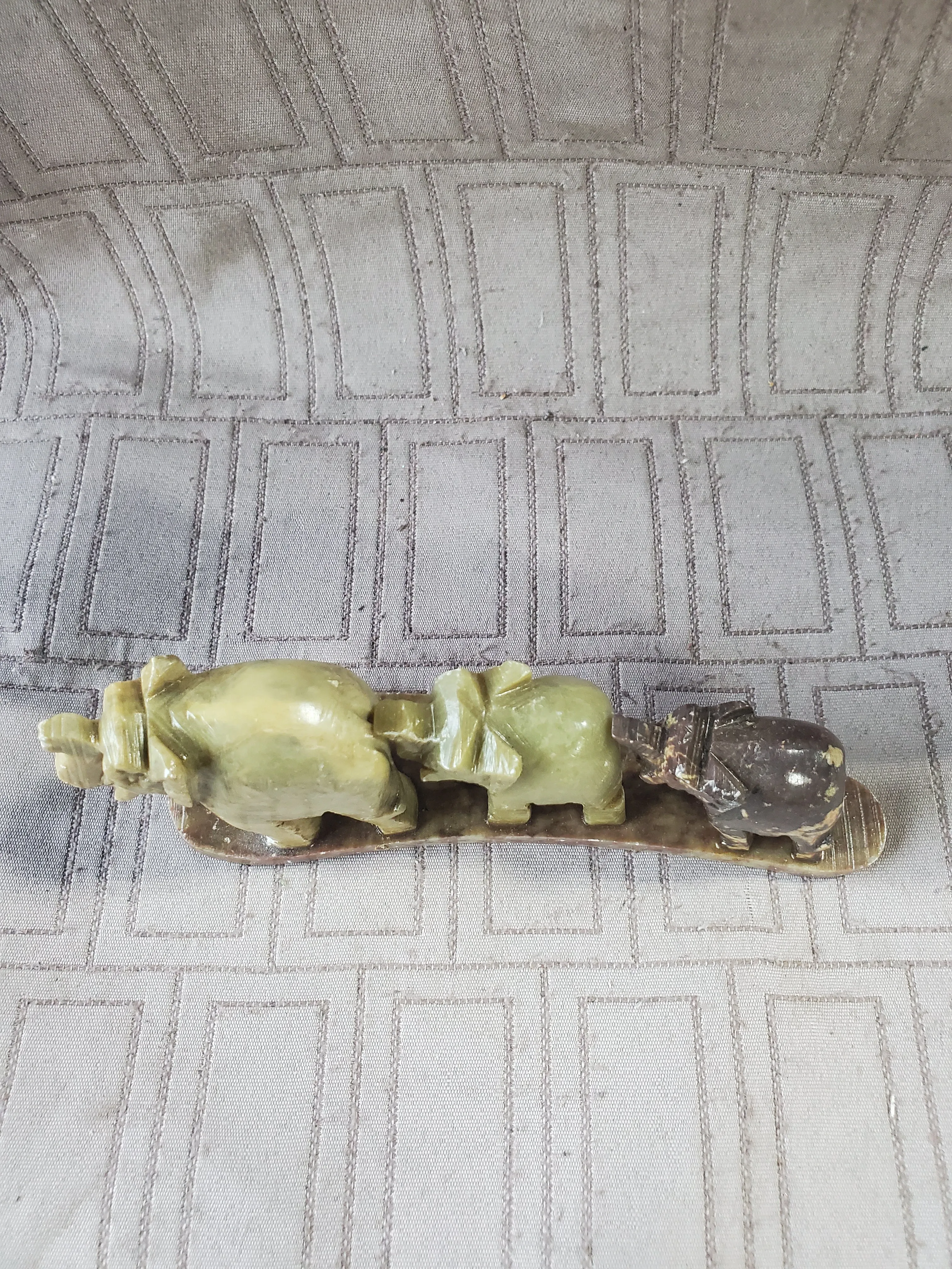 Carved Stone Elephants in a Line Paperweight