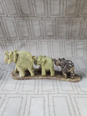 Carved Stone Elephants in a Line Paperweight