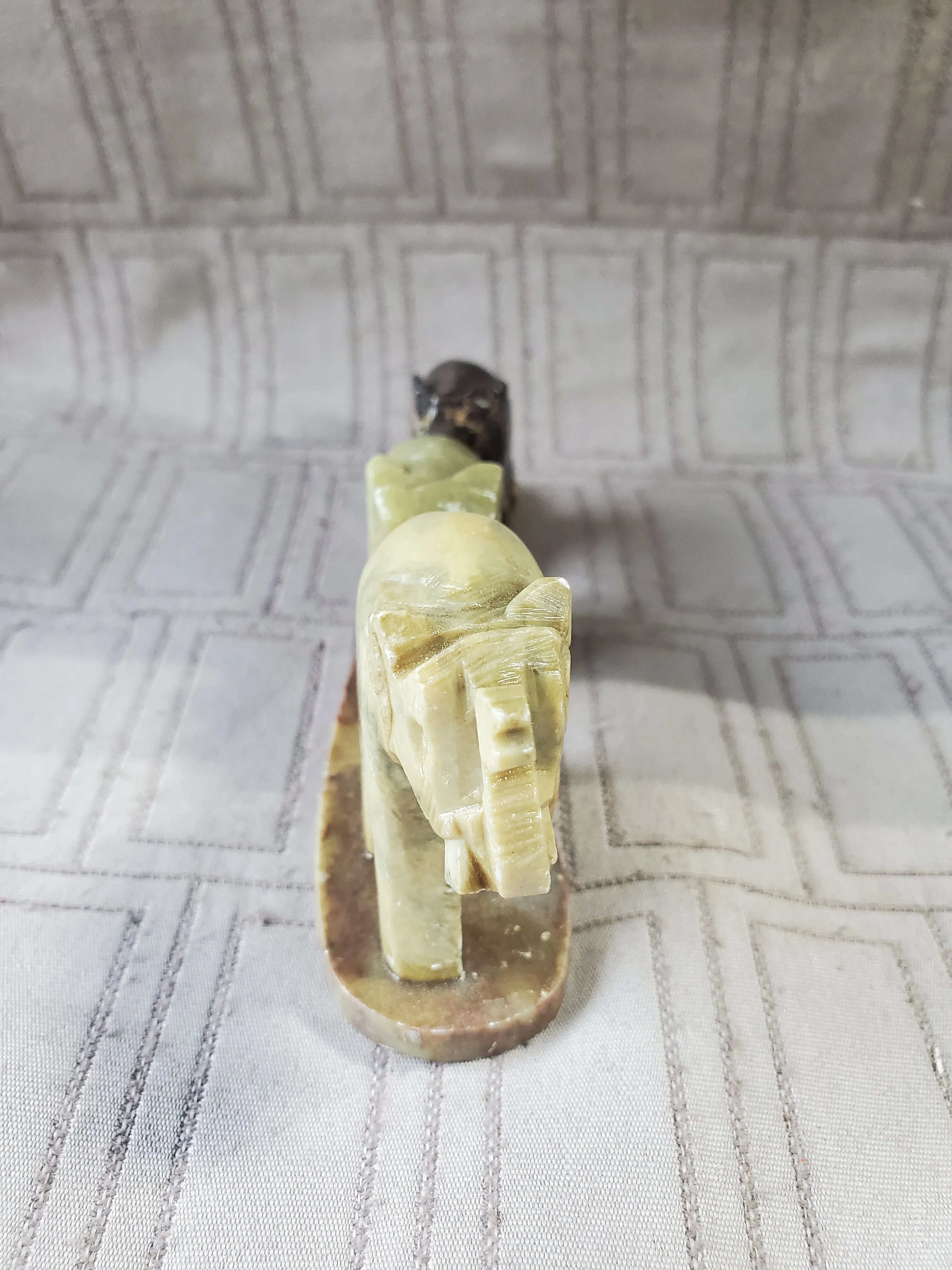 Carved Stone Elephants in a Line Paperweight