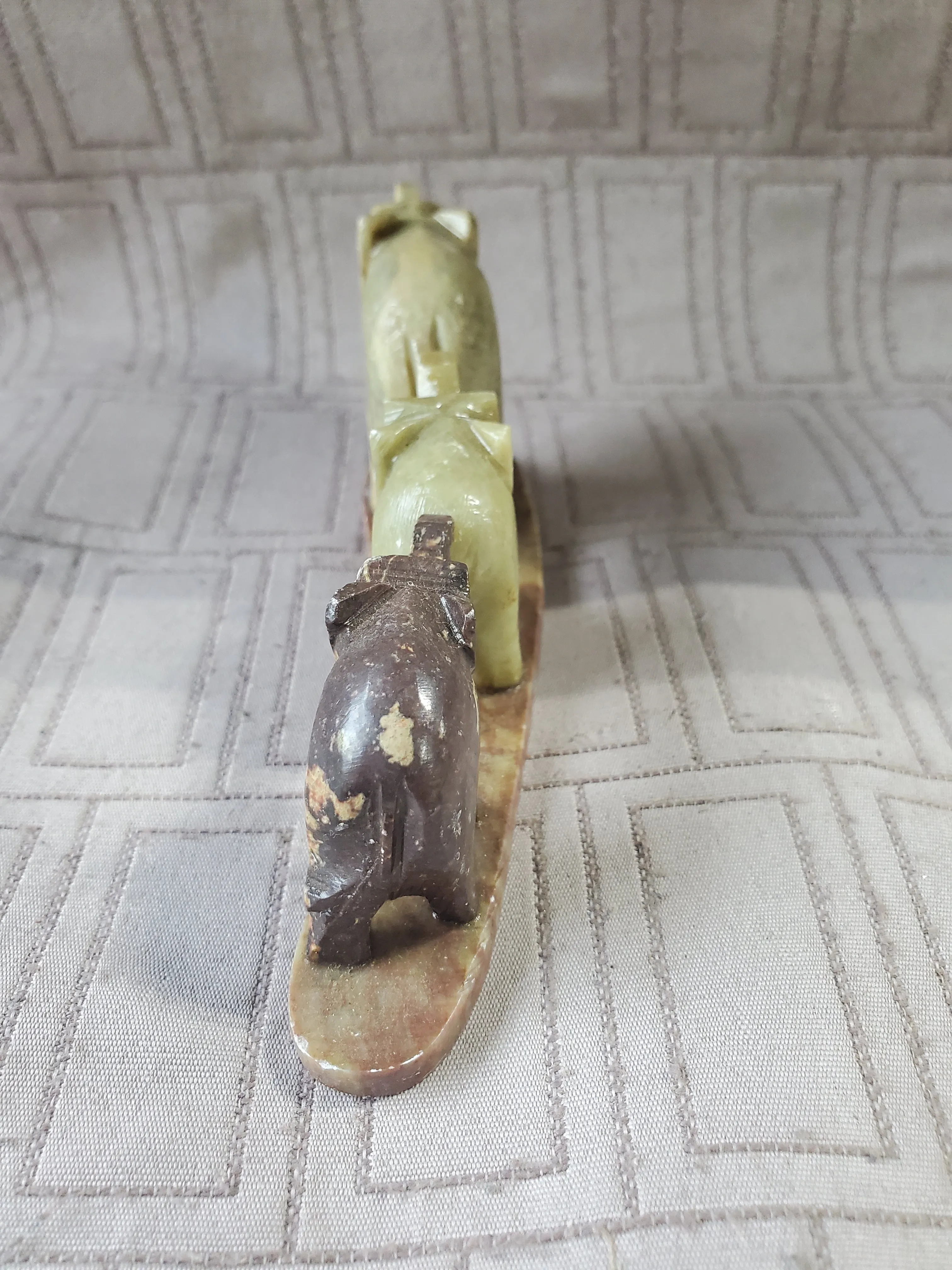Carved Stone Elephants in a Line Paperweight