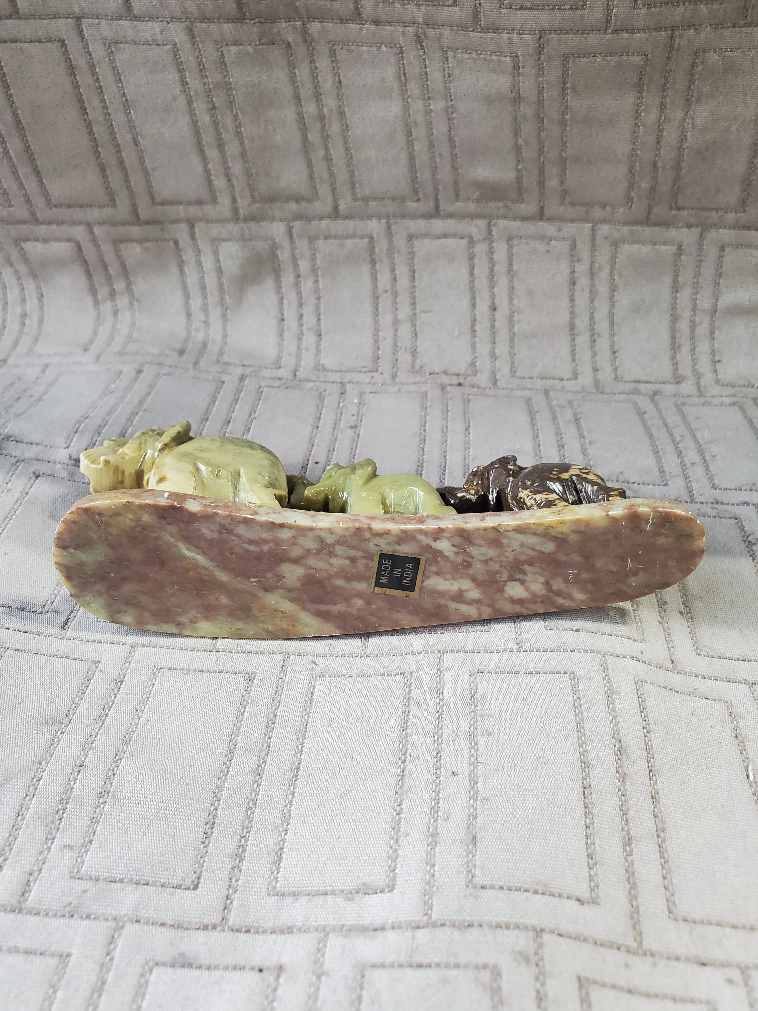 Carved Stone Elephants in a Line Paperweight