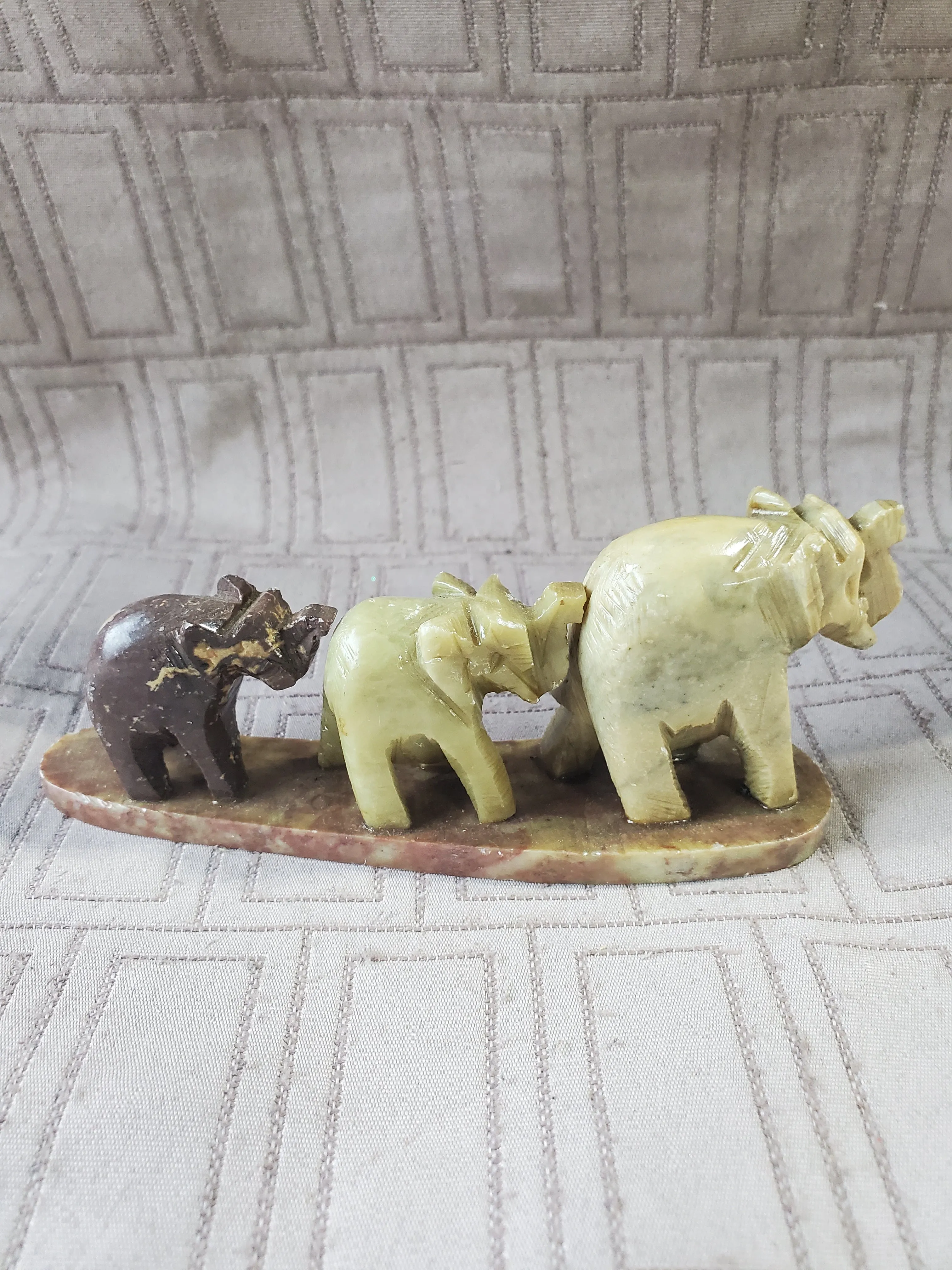 Carved Stone Elephants in a Line Paperweight